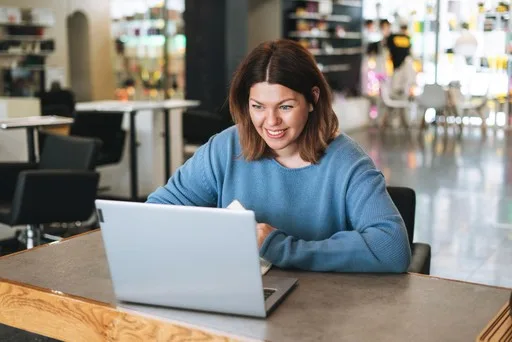 A team member configuring enterprise call settings on a laptop.
